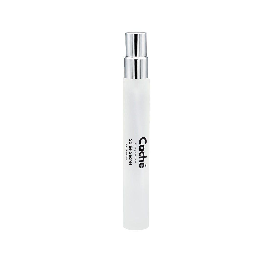 White perfume travel spray with clear silver nozzle, Caché label