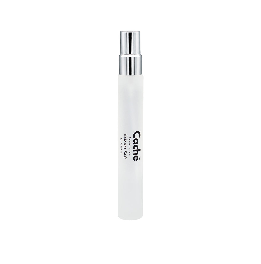 White fragrance bottle with silver spray pump and “Caché” label