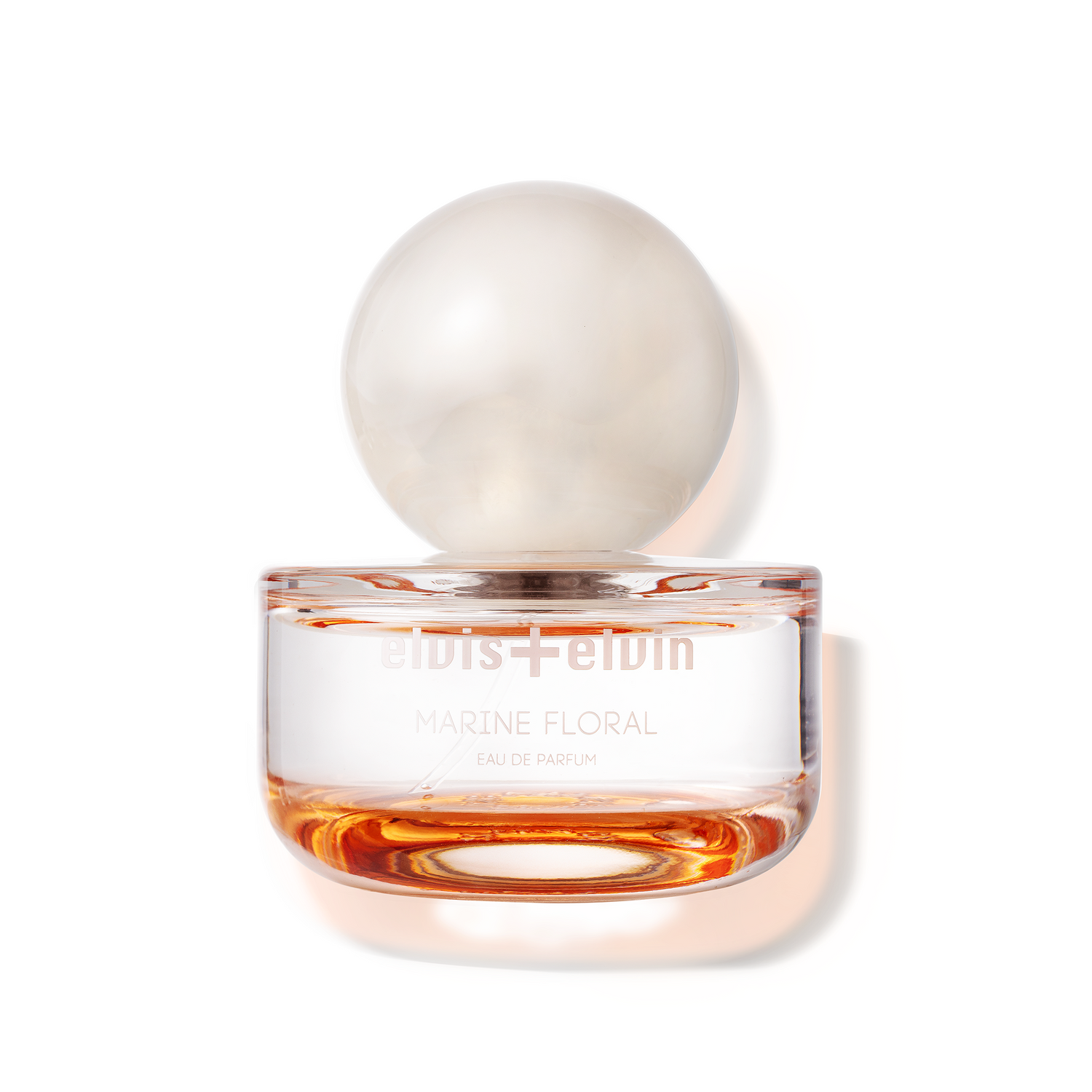 elvis+elvin Marine Floral eau de parfum bottle with frosted globe cap and amber liquid