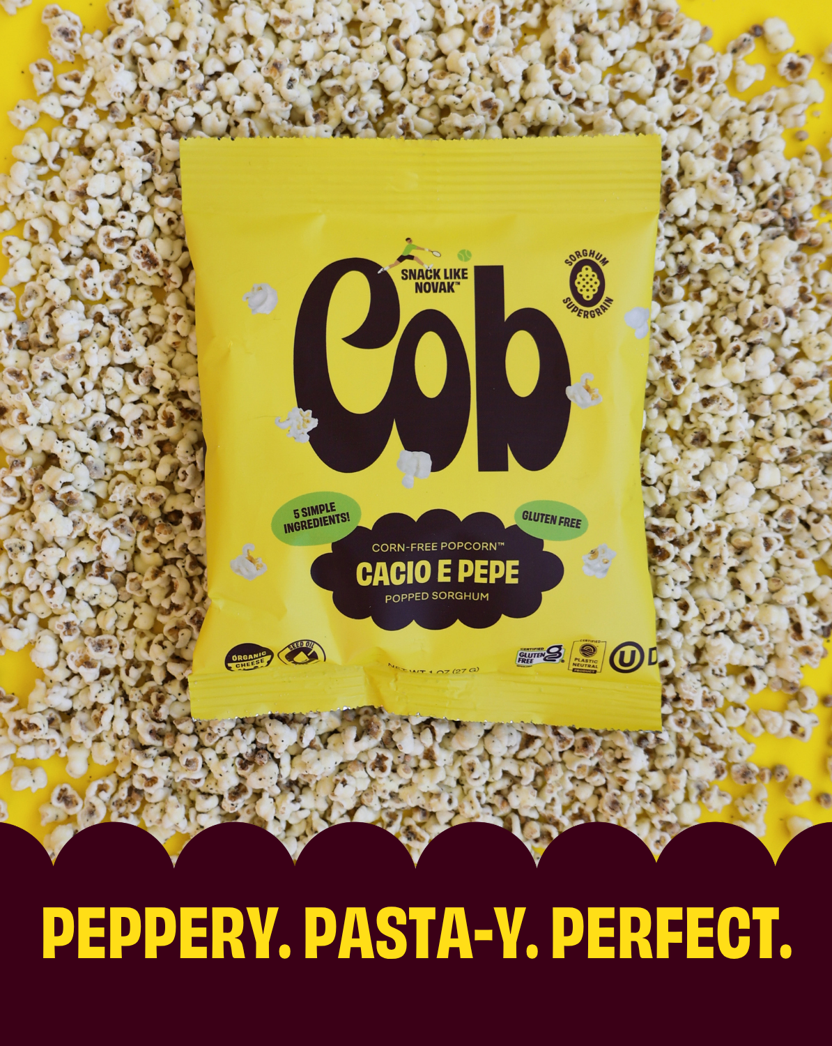 Cacio e Pepe snack bag with gold “6” logo on a backdrop of popcorn kernels