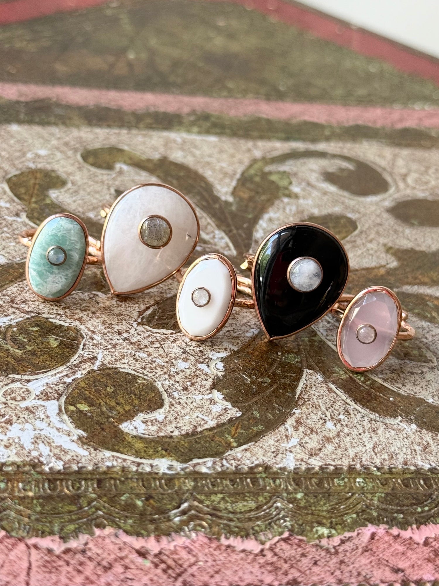 Capricorn set of mixed-color disc earrings, round and oval studs with gold-tone backs