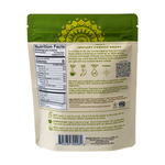 Back of green instant herbal coffee pouch with nutrition facts and product details