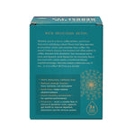 Teal box of roasted dandelion dark roast herbal tea with product description text on back