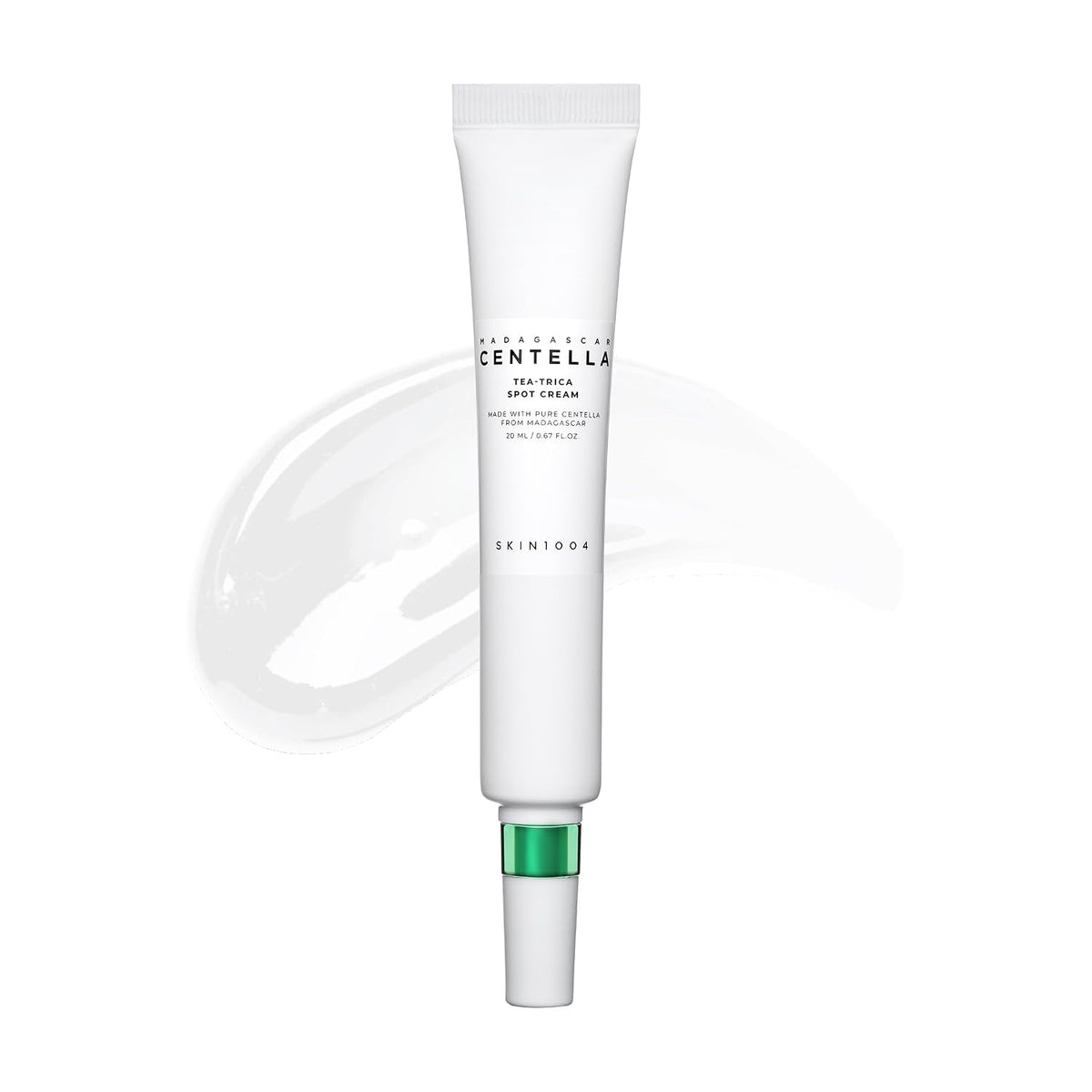 Spot cream tube with white body and green base, SKIN1004 branding