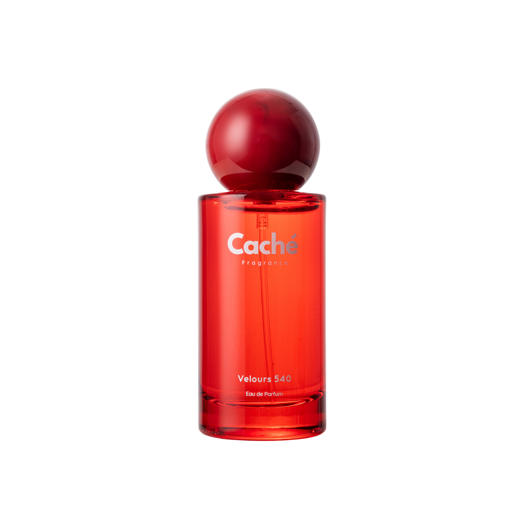Caché Velours 540 perfume bottle with red globe cap and red tinted glass on white