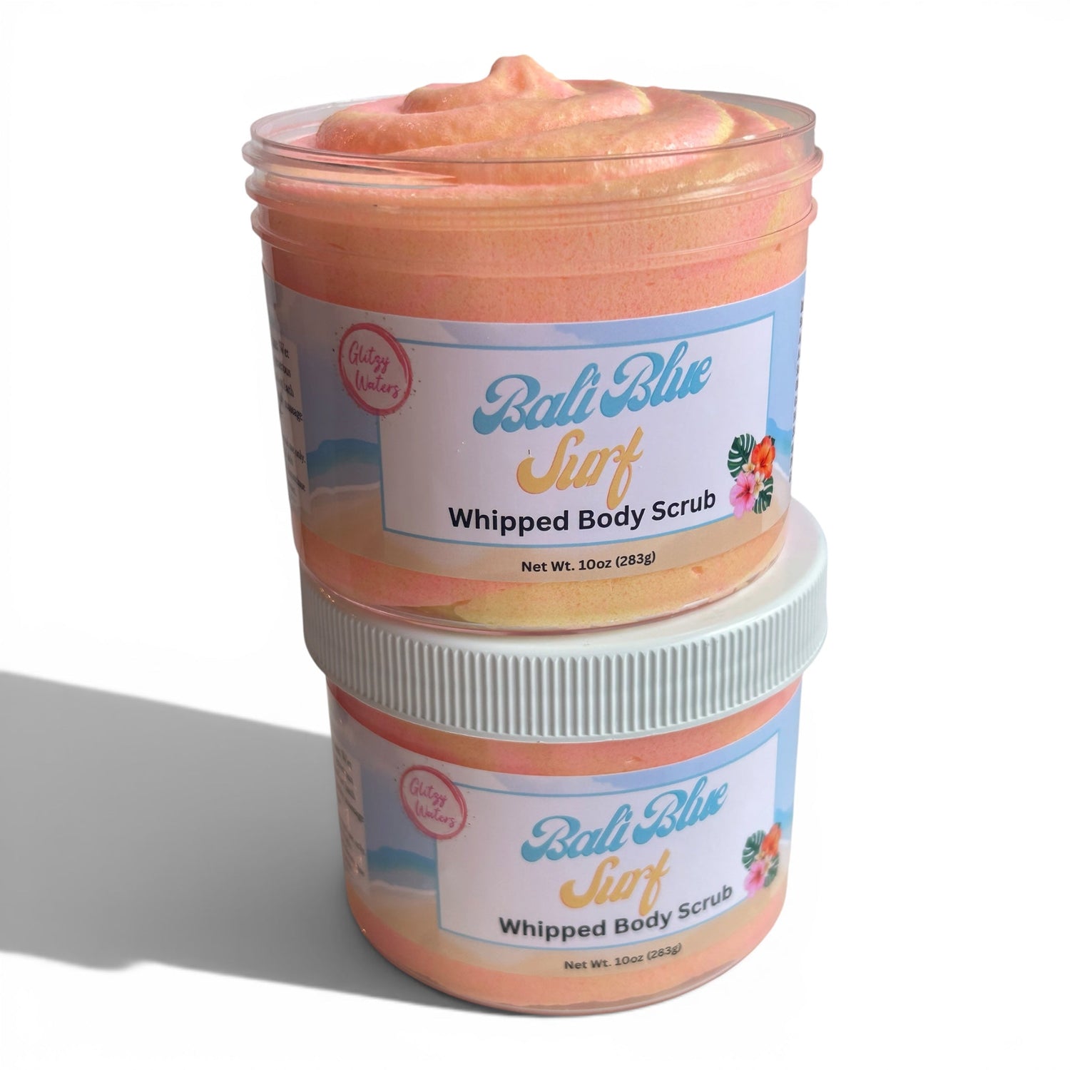 Whipped body scrub jar with pink-orange sugar scrub, two jars stacked