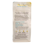 Cream-colored back panel of herbal coffee pouch with printed product details