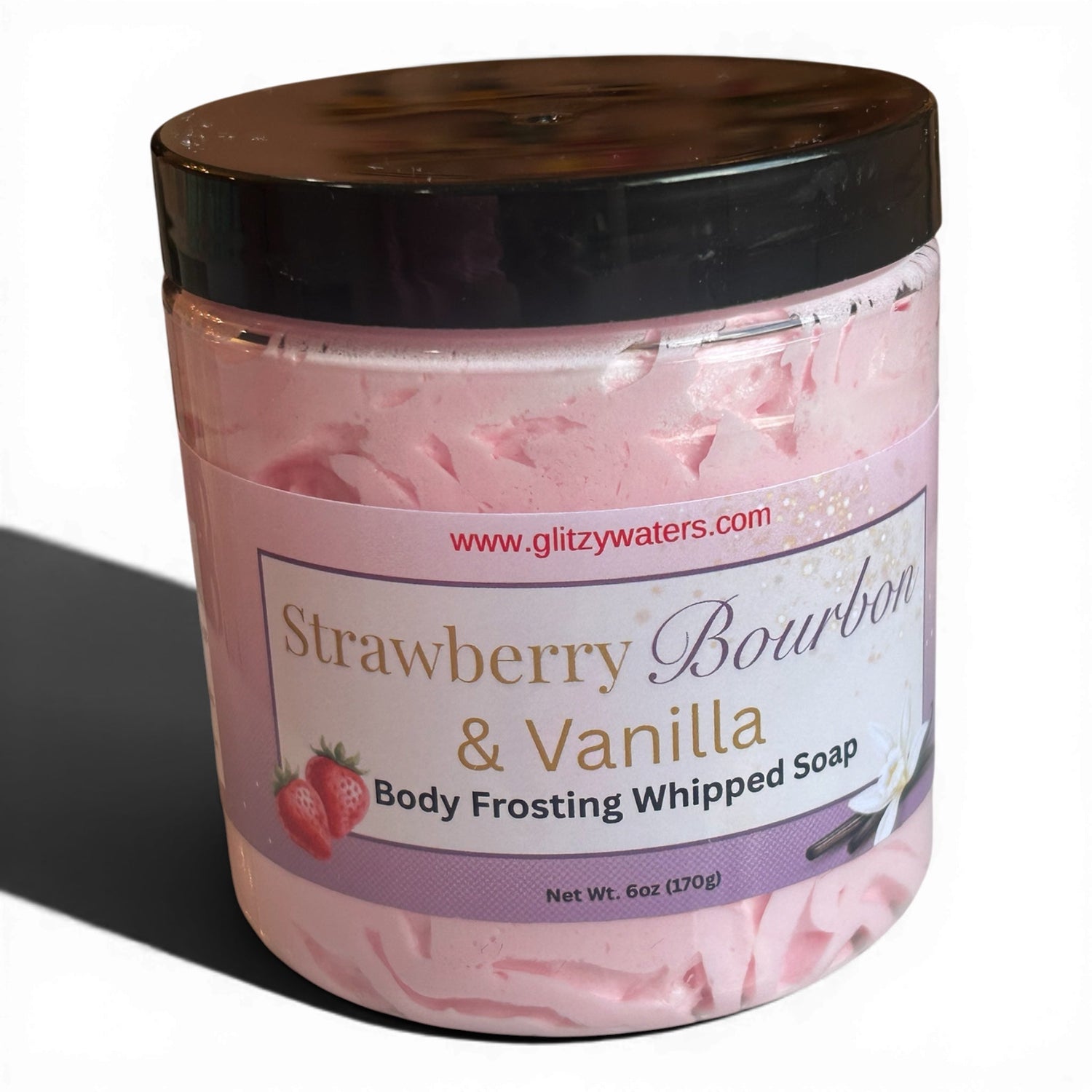 Pink whipped body frosting soap jar with dark lid and strawberry vanilla label