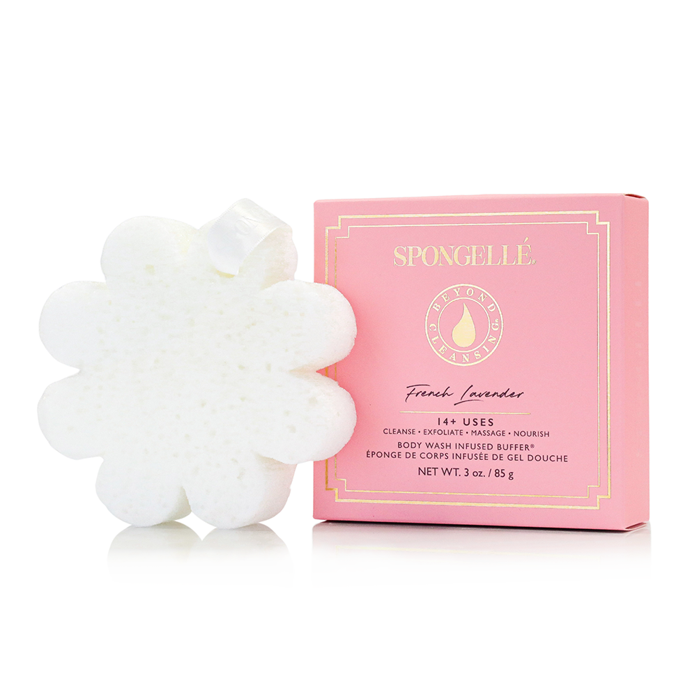 French lavender flower-shaped bath sponge beside a pink boxed package