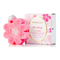 Pink flower-shaped body scrub buffer with gray hanging ribbon tag
