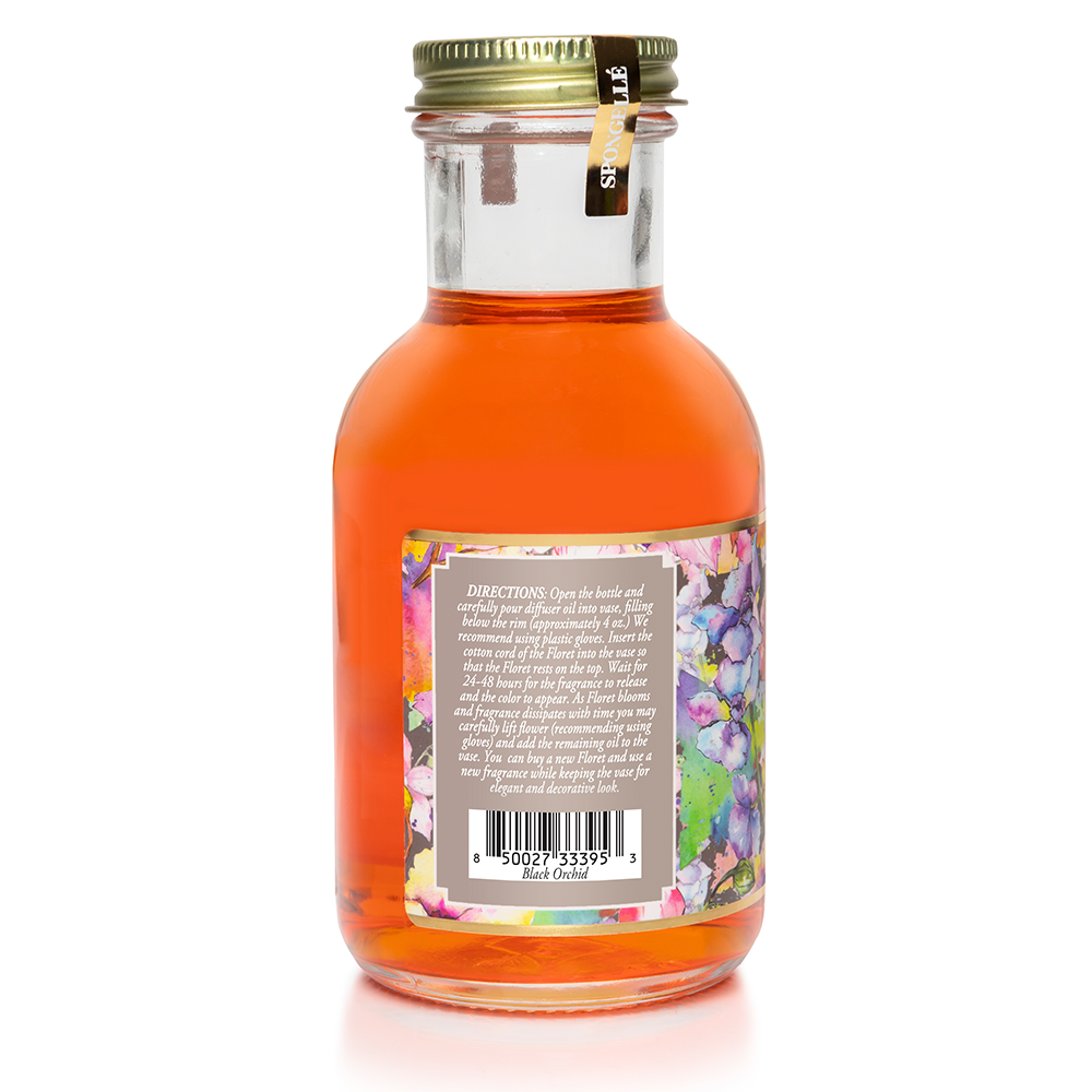 Diffuser oil bottle back view with directions label, barcode, gold cap, orange liquid