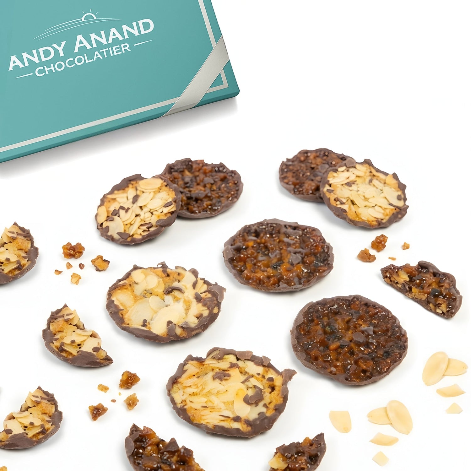 Dark chocolate florentine cookies with almond slices and orange zest pieces