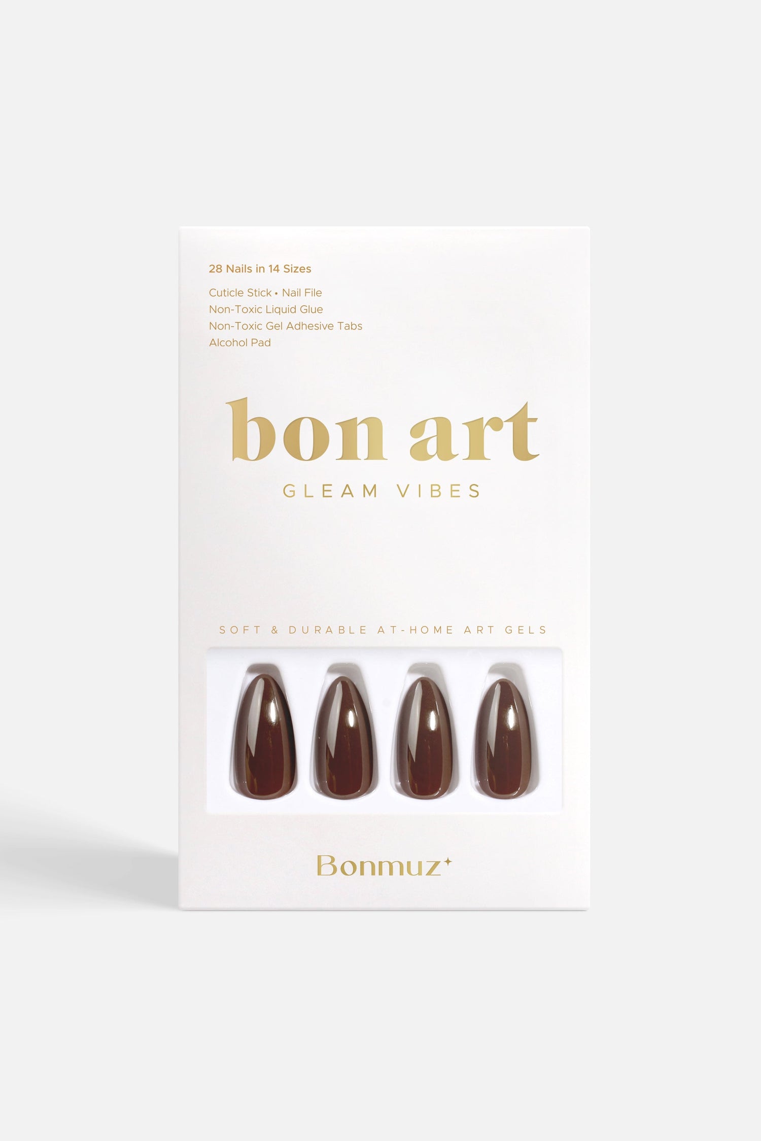 Set of glossy dark brown press-on nails in a display box
