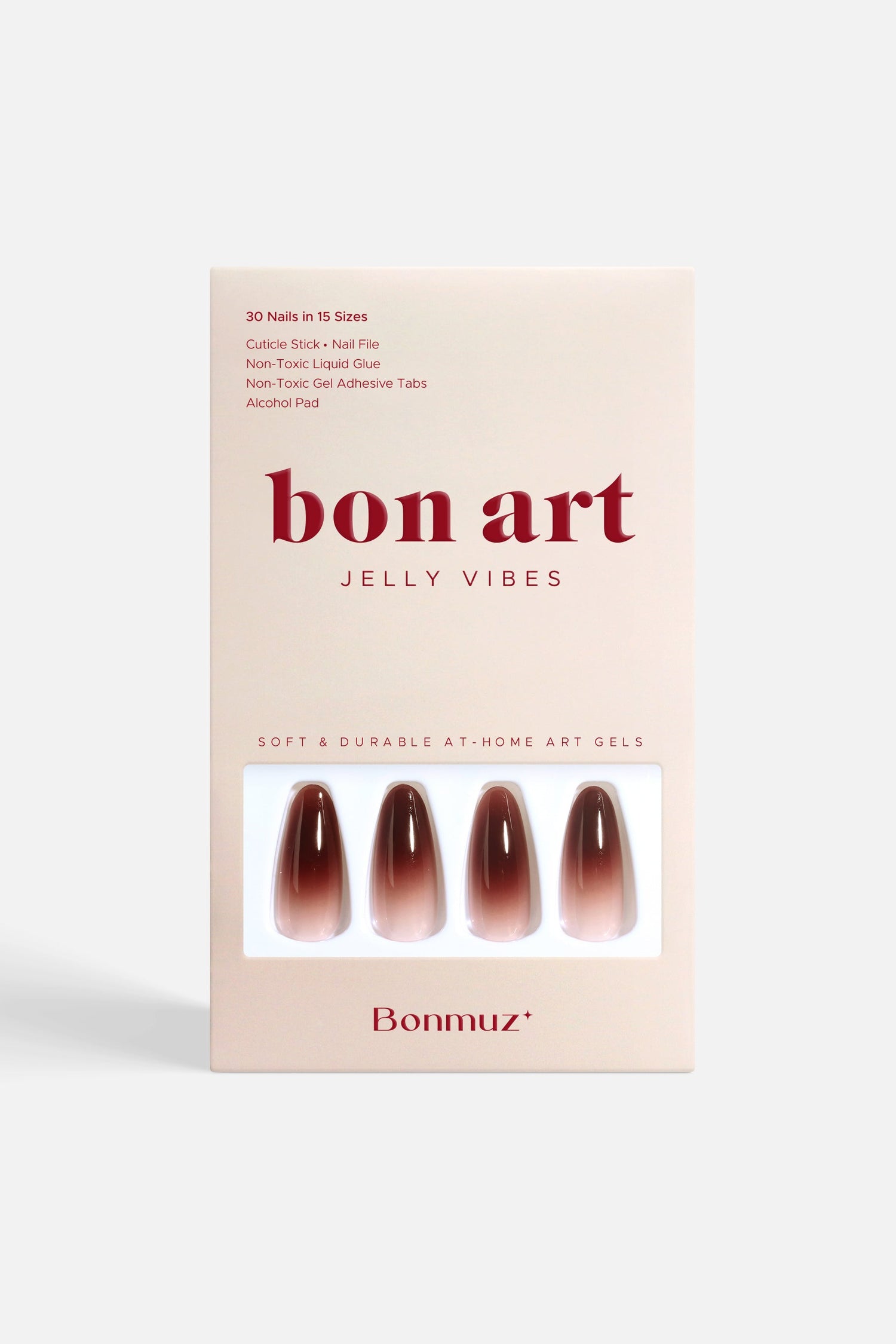 Press-on nails box with four glossy ombré berry-brown nails