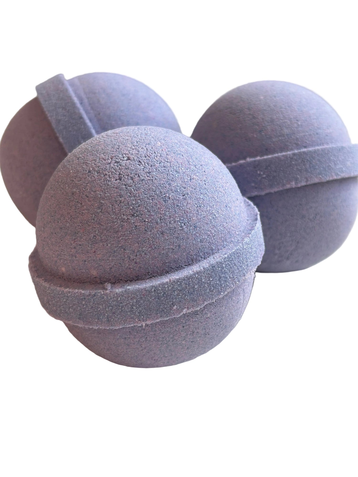 Round lavender bath bombs, dark purple with rough, fizzy-textured surface