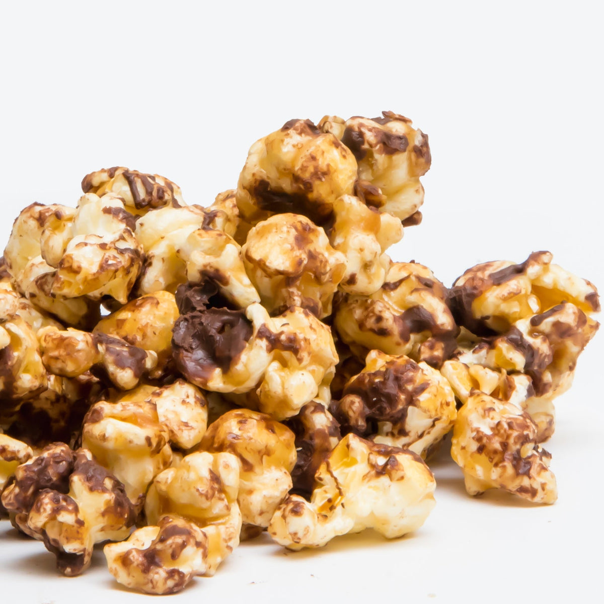 Chocolate toffee popcorn clusters with golden caramel and dark chocolate coating