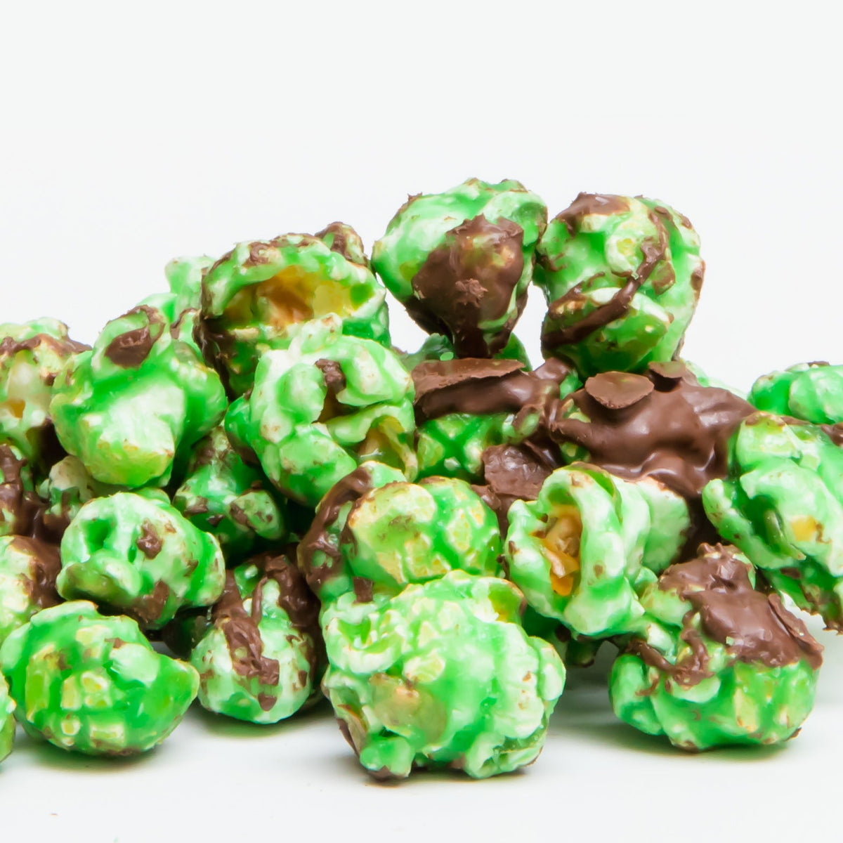 Chocolate mint popcorn clusters with green and dark chocolate pieces