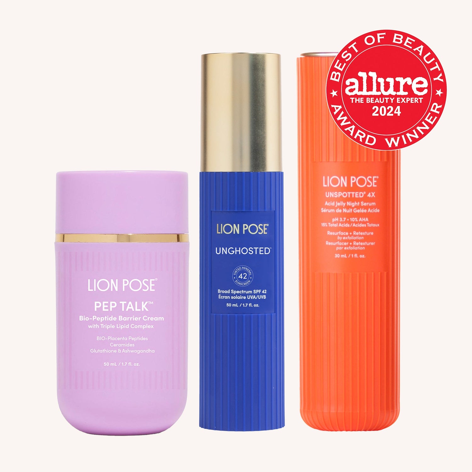 Skincare bundle with purple cream jar, blue unghosted SPF tube, orange bottle