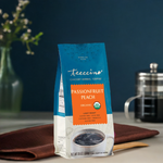 Teecino Passionfruit Peach herbal coffee blend pouch with orange label, 10 oz, all-purpose grind.