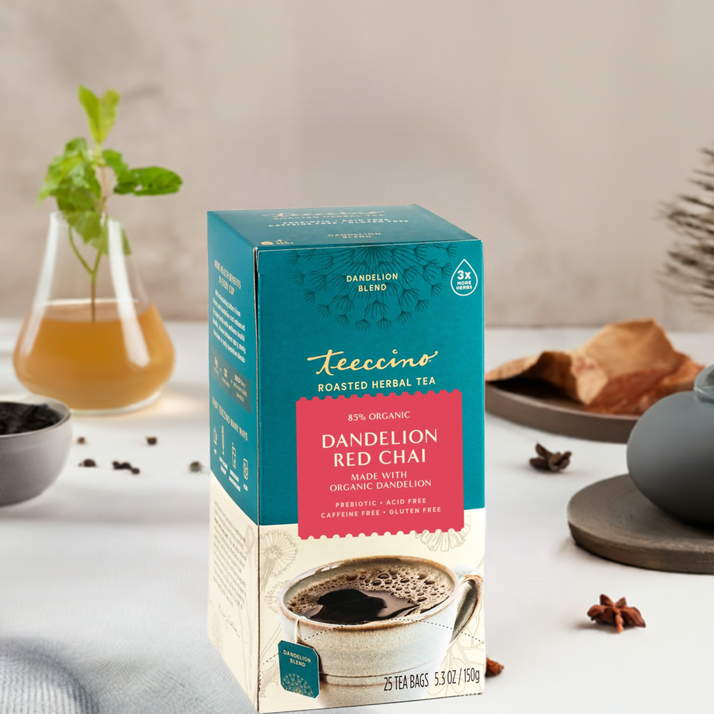 Roasted herbal tea box on counter; teal carton with red dandelion red chai label.
