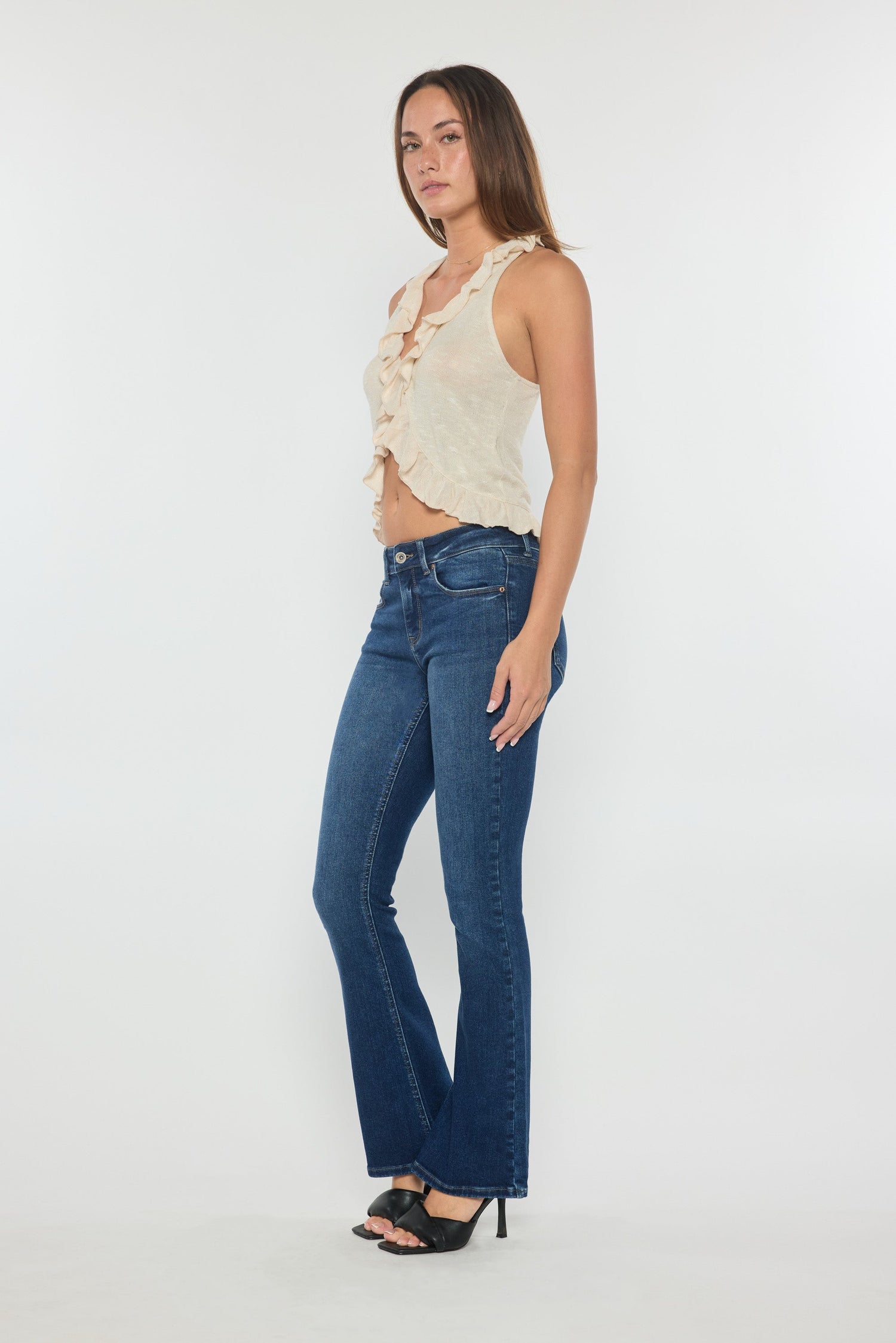Mid-rise bootcut jeans in medium blue wash with classic 5-pocket styling