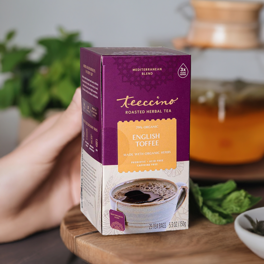 English toffee roasted herbal tea box held in hand, prebiotic 3x more