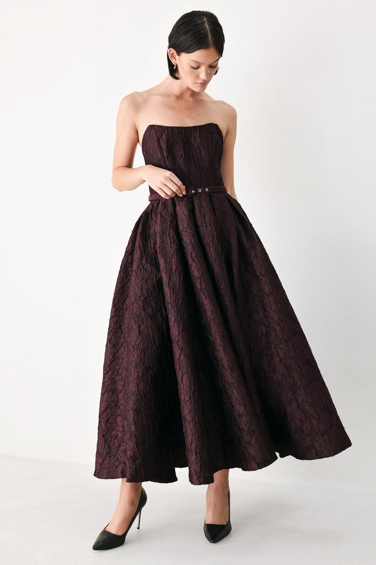 Burgundy strapless woven midi dress with full A-line skirt and belted waist