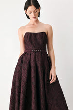 Burgundy strapless woven midi dress with pleated full skirt and belted waist
