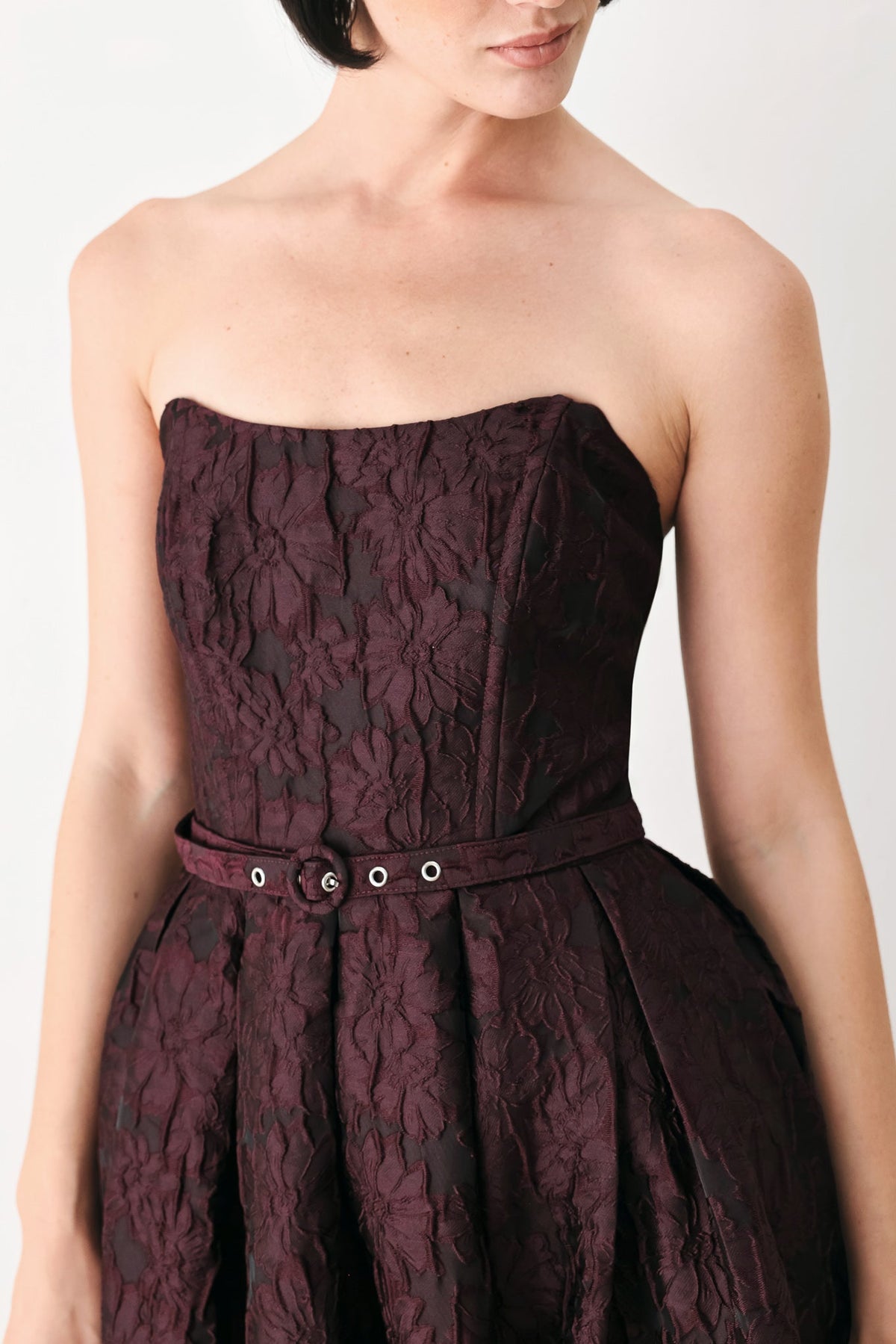 Burgundy strapless woven midi dress bodice with belt and ring buckle hardware