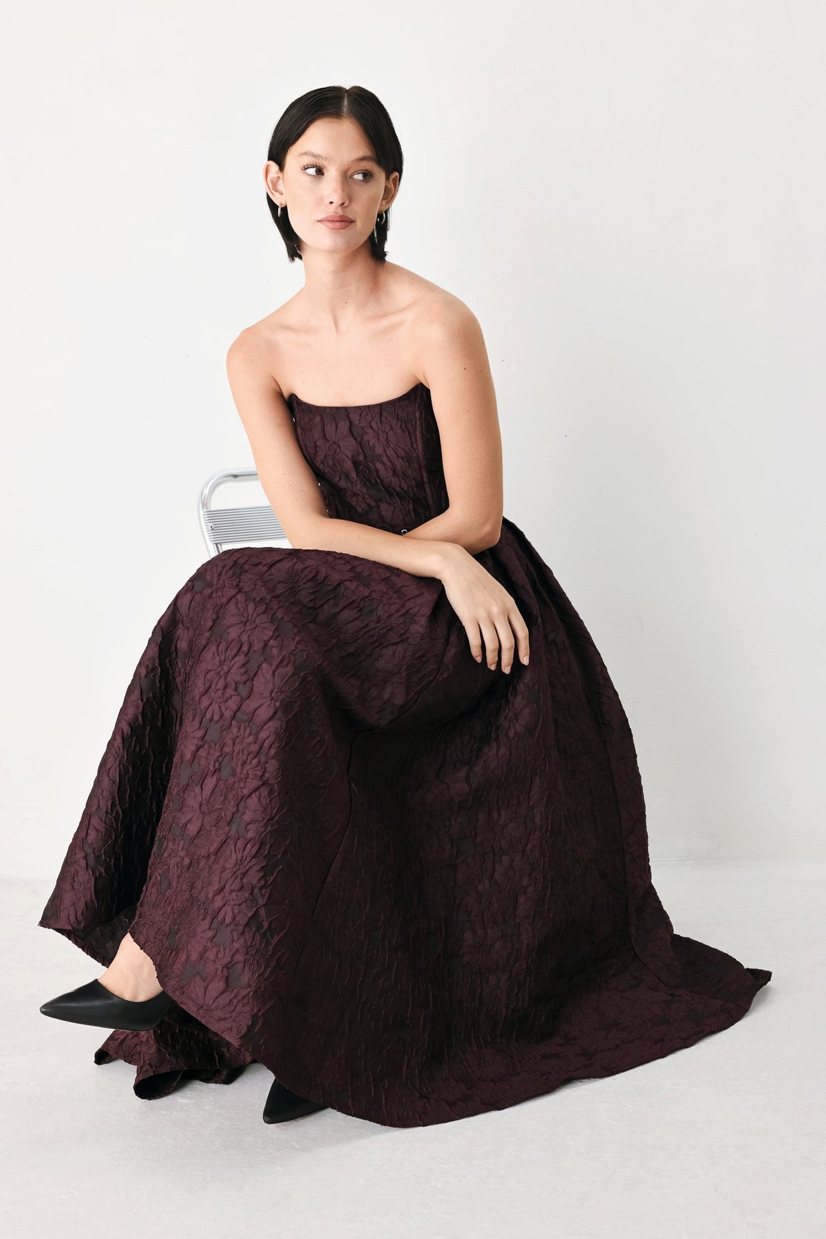 Burgundy strapless woven midi dress with corset bodice and belted waist detail
