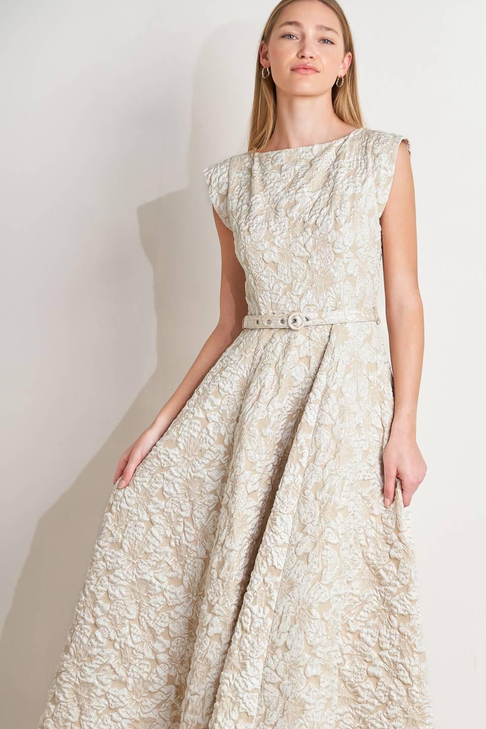 Ivory sleeveless midi dress with textured floral weave and wide belt, side view.