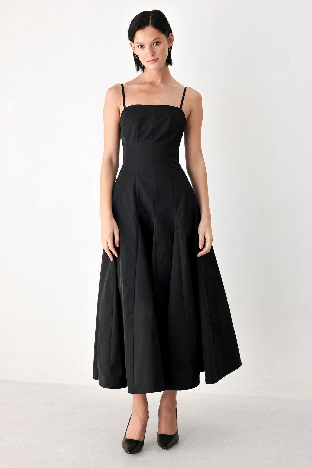 Black midi dress with spaghetti straps and sweetheart bodice, full gathered skirt
