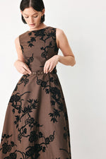 Brown sleeveless midi dress with black floral print and eyelet buckle waist belt detail