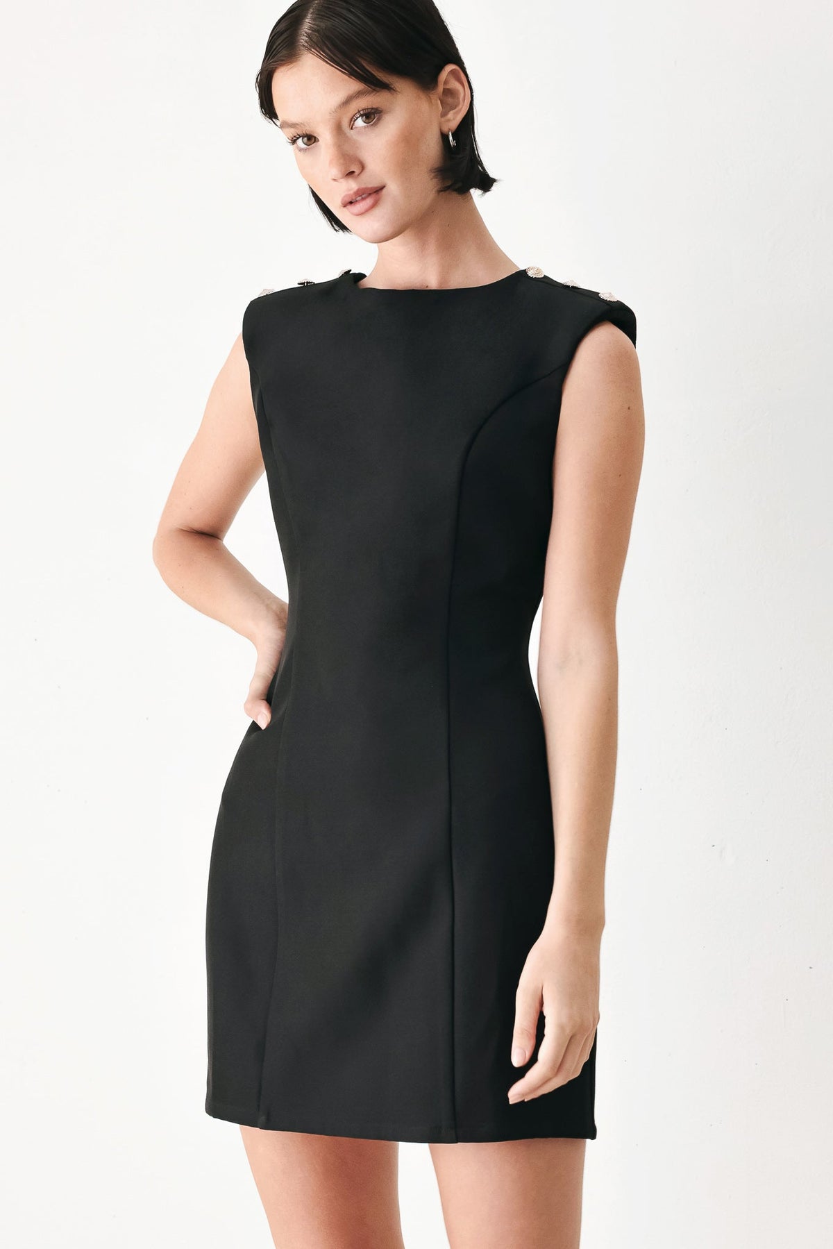 Black sleeveless mini shift dress, side-seam panels
