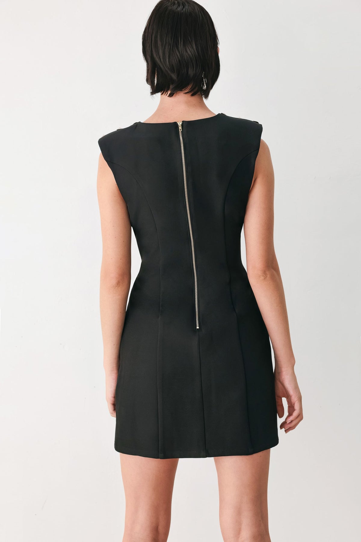 Black sleeveless mini shift dress, center back zipper