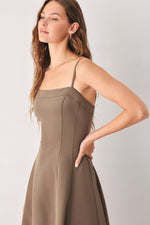 Mocha woven midi swing dress close-up with spaghetti straps and fitted bodice