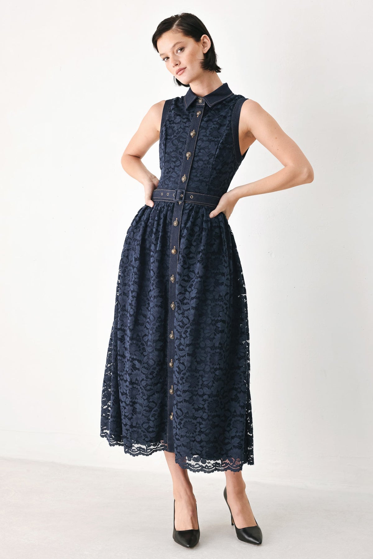 Navy lace midi dress with sleeveless bodice, button front and waist belt