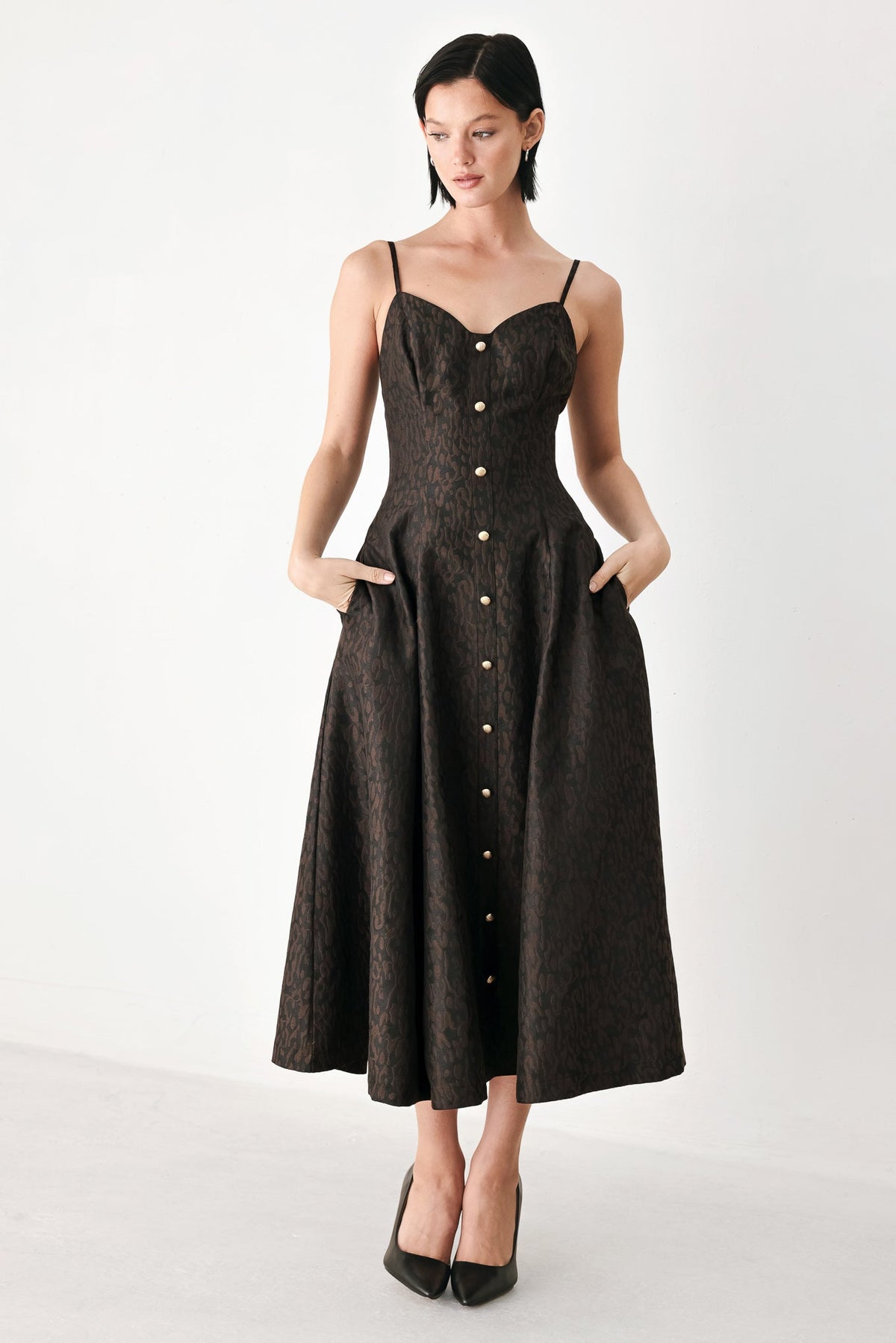 Dark patterned midi dress with sweetheart neckline, spaghetti straps, button front