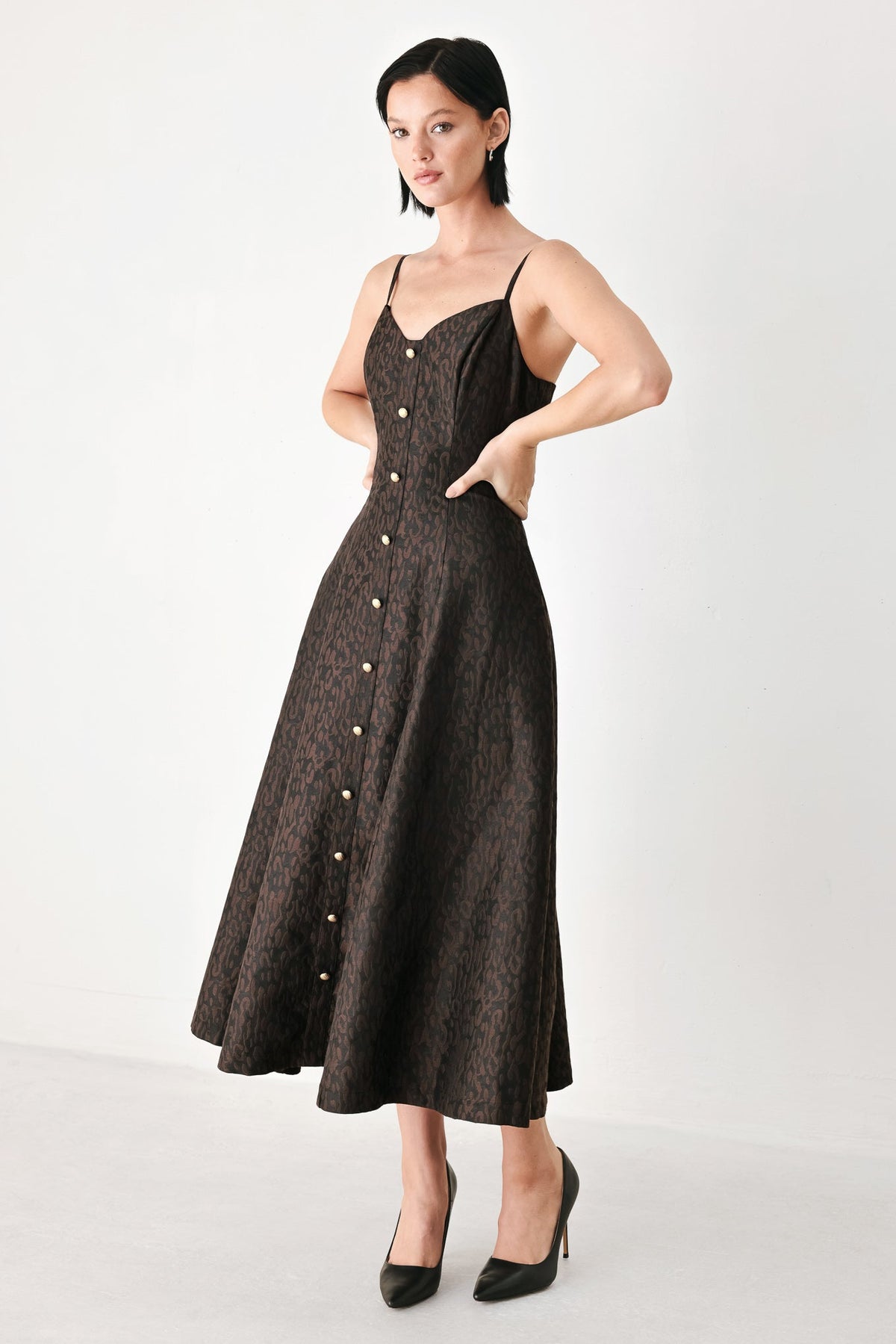 Dark patterned midi dress with spaghetti straps and button front, sweetheart bodice
