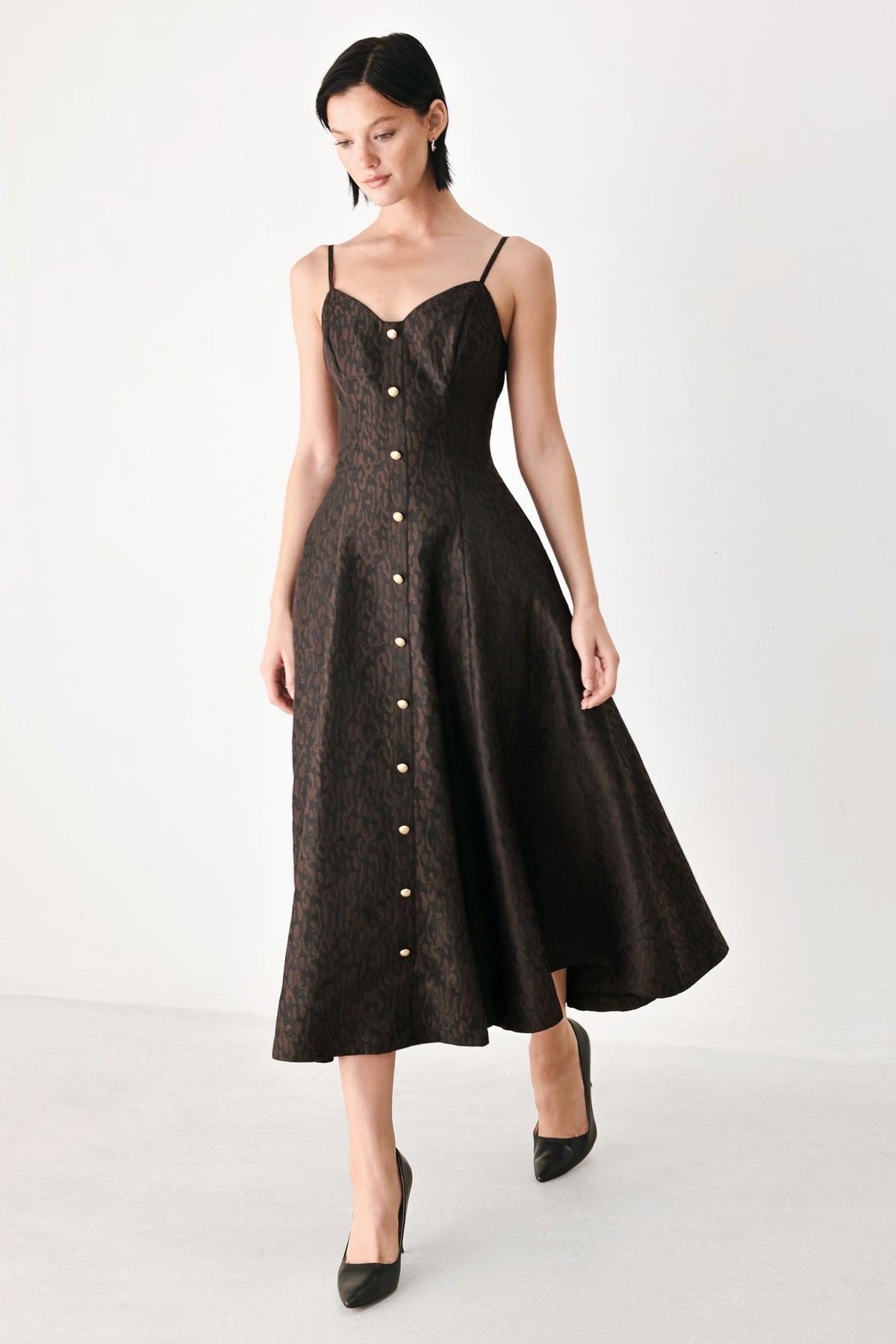 Dark patterned midi dress with sweetheart neckline, spaghetti straps, gold-button front