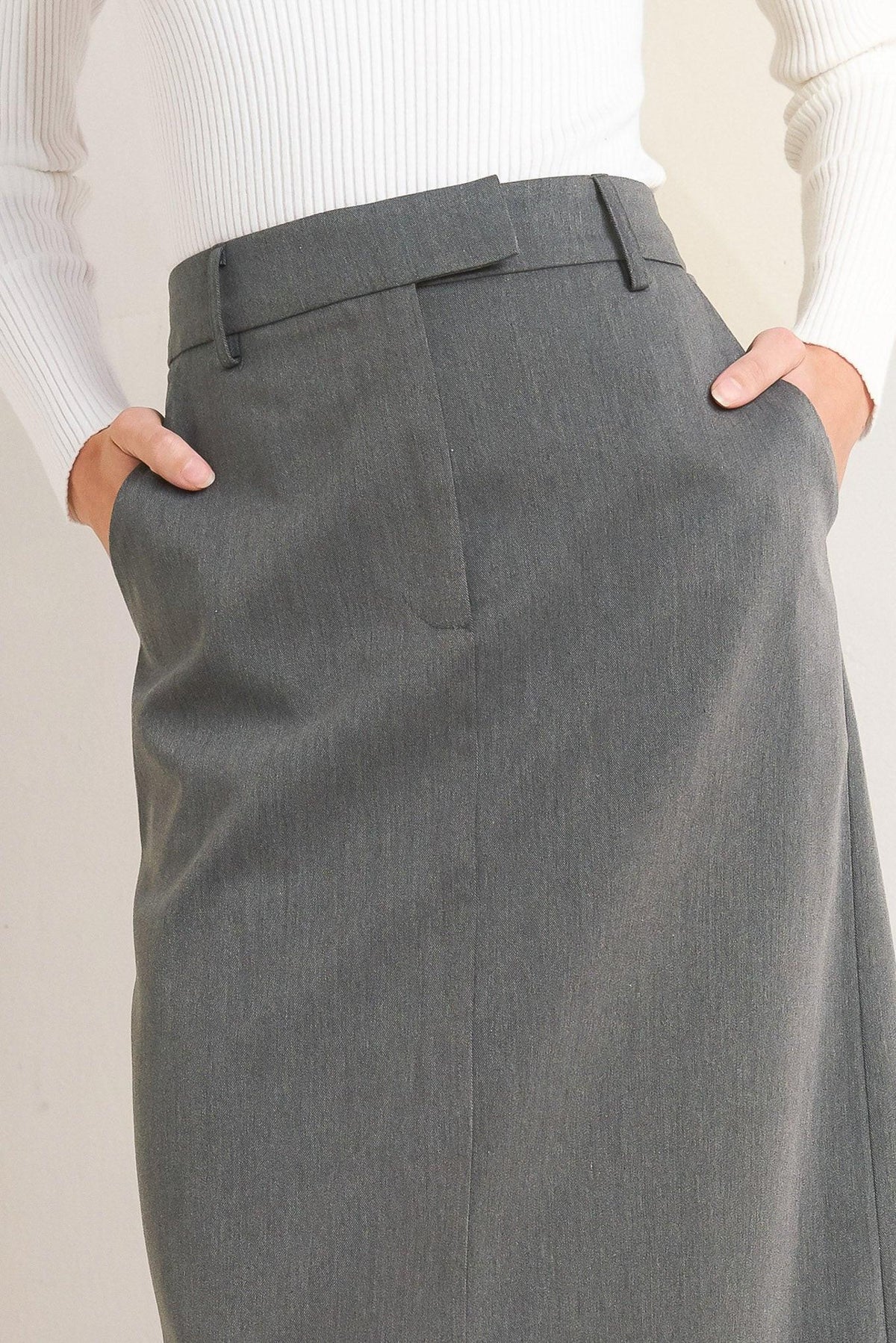 Woven skirt in dark gray charcoal, close-up of back waistband and center seam