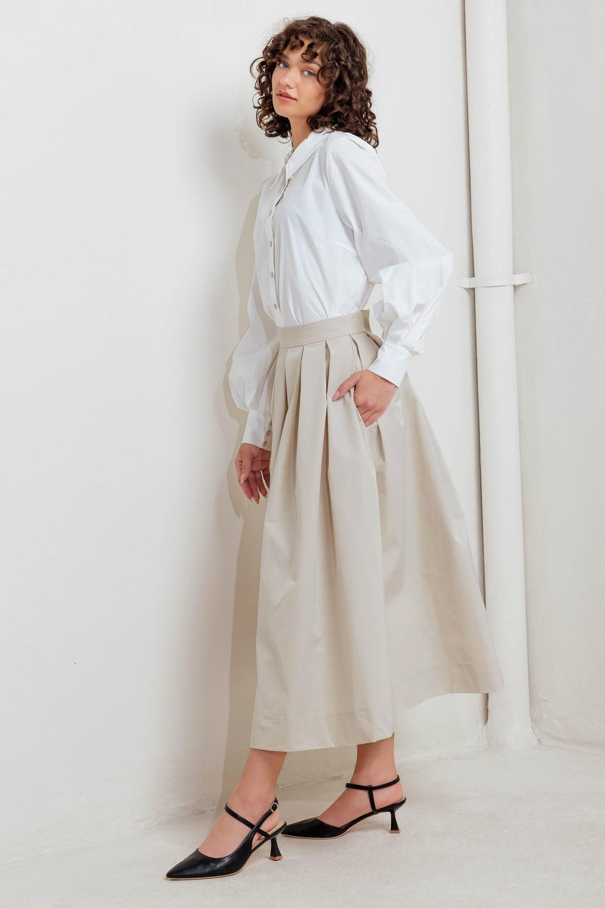 Cream full midi woven skirt with pleated panels and waistband with front pleat lines