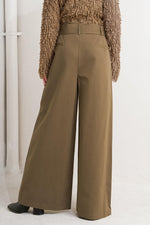 Brown woven wide-leg pants with high waistband and belt loops