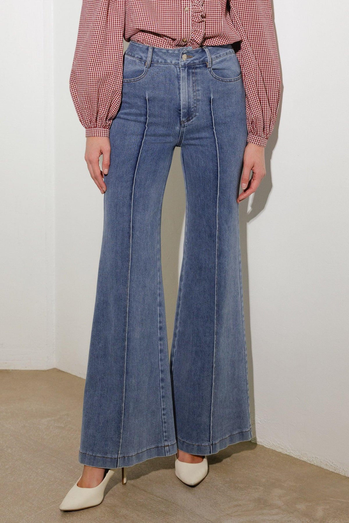Medium wash stretch denim wide-leg pants, high rise, front button closure, belt loops