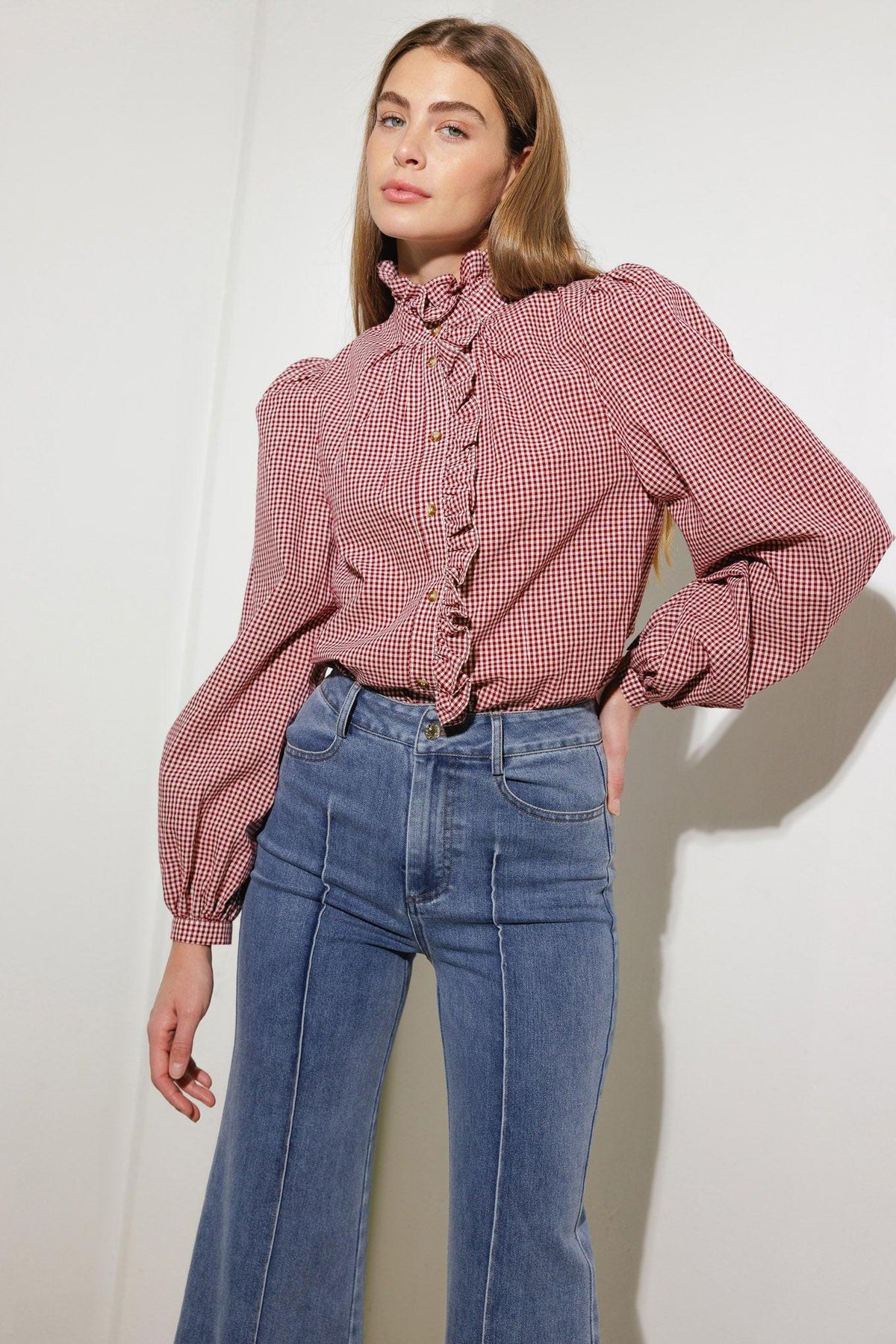 Medium wash stretch denim wide-leg jeans with back yoke seam and back pockets
