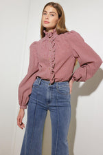 Medium wash stretch denim wide-leg jeans with back yoke seam and back pockets