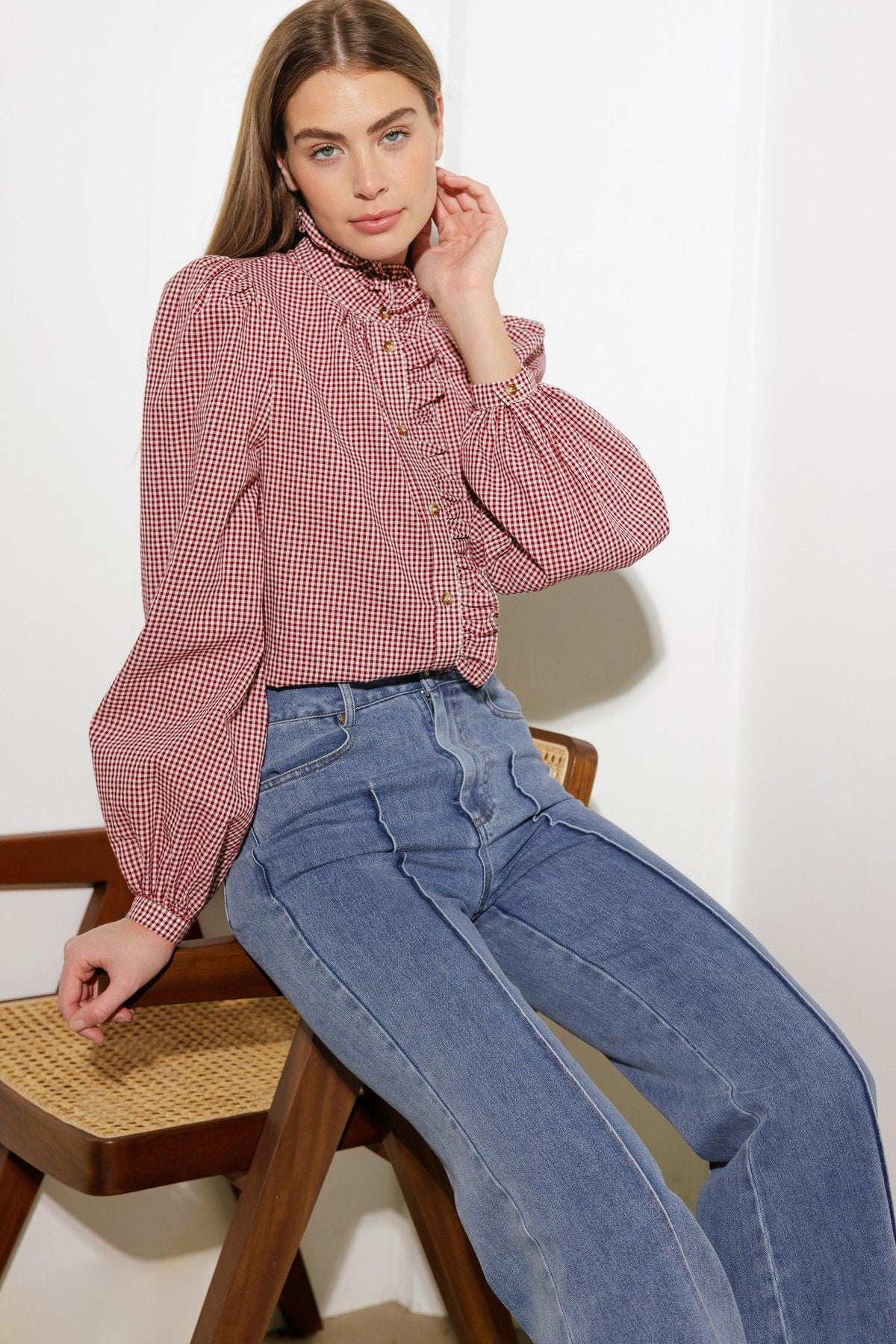 Medium wash stretch denim wide-leg jeans with front pockets and high-rise waistband