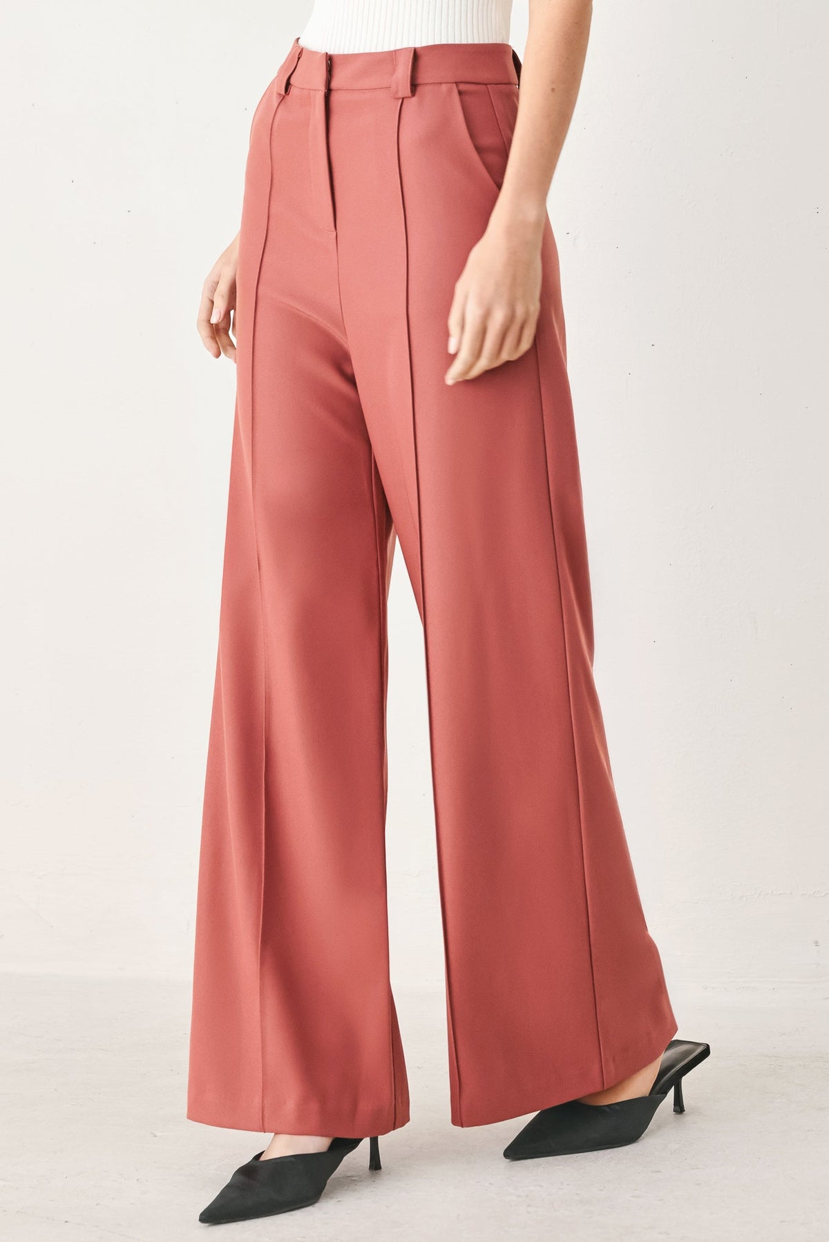 Rose wide-leg woven pants with front crease, belt loops, and side pockets