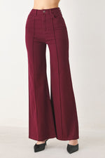 Women’s burgundy twill pants, high-rise wide leg with button front and side pockets.