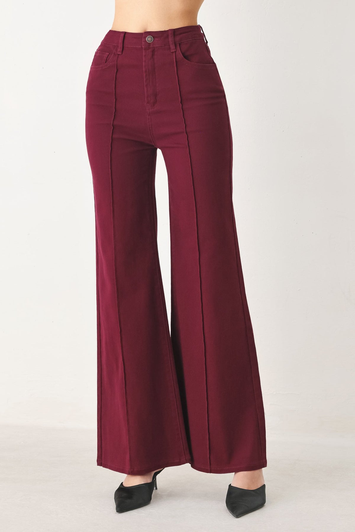 Women’s burgundy twill pants, high-rise wide leg with button front and side pockets.